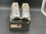 brand new balance shoes in a box on a black surface