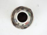 a vase with a hole in the middle of it