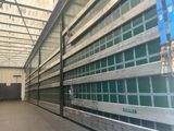 a large warehouse with a lot of windows in it