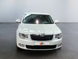 a picture of a white car parked in a showroom