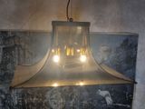 a chandelier hanging from the ceiling in a room