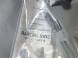 a pair of scissors sitting on top of a piece of paper