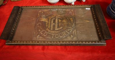 a tray that has a logo on it on a table