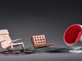 two chairs and a chair are sitting next to each other on a gray surface