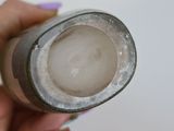 a person holding a bottle with a lot of liquid in it