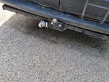 a close up of a car with a flat tire
