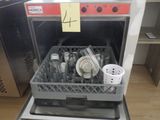 un lave-vaisselle rempli de vaisselle sale