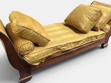 a chaise with pillows on top of it on a white background