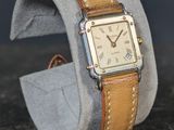 a watch that is sitting on top of a watch band