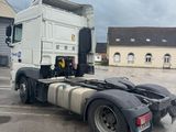 a semi truck that is parked in a parking lot
