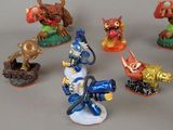 many figurines of different colors and sizes on the table
