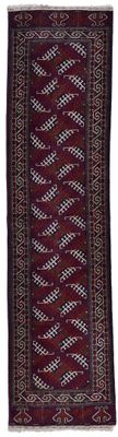 un tapis rouge et noir sur fond blanc