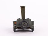 a small toy army vehicle on a white surface