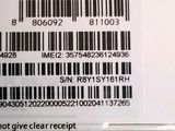 a close up of a bar code on a refrigerator door