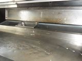 an image of a stainless steel oven with a lot of food inside of it