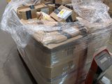 a large pile of boxes sitting on a pallet in a warehouse