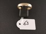 a close up of a ring with a price tag on it