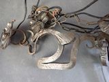 a bunch of old metal objects that are on a table