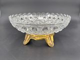 an image of a glass bowl on a gold stand