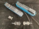 two different models of a boat on a table