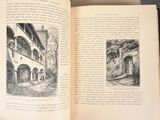 an open book with a picture of a building on it