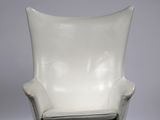 an image of a white leather chair on a white background