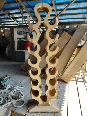 a picture of a wine rack made out of wood