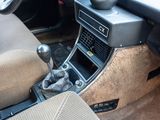 a car dashboard with a control panel and a steering wheel