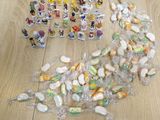a pile of candy sitting on the floor next to a bag of candy