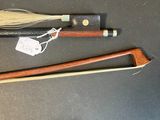 three different types of canes and a broom on a table