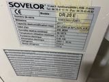 a close up of a white refrigerator with a sticker on it