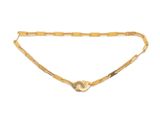 a close up of a gold belt with a circular clasp