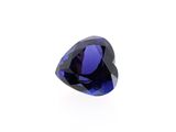 a close up of a blue sapphire stone on a white background