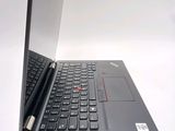 a laptop that is open and sitting on a table