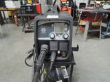 an image of a welding machine in a workshop