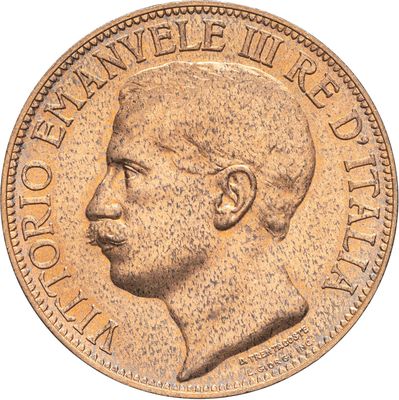 Gros plan sur une pièce de monnaie portant le visage d'un homme