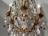 an image of a chandelier hanging from a ceiling in a room