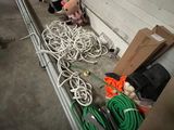 a pile of wires and a stuffed animal on the floor