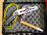a tool in a case that is sitting on a table