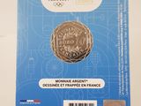 the front of a coin with a picture of a lion on it