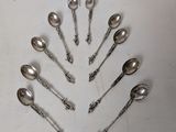 a lot of spoons in the shape of a christmas tree