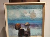une peinture à l'huile représentant deux personnes assises sur un banc au bord de l'eau