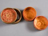 three bowls that are sitting on a table