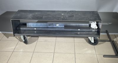 an image of a television sitting on top of a cart