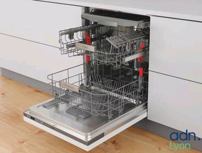a dishwasher in the middle of a kitchen counter