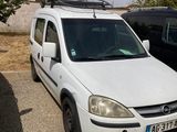 a white van that is parked in a parking lot