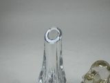 a small glass vase and a smaller glass vase