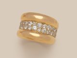 an 18k yellow gold and diamond band ring