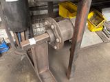 a picture of a machine that is sitting in a garage