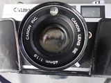 a close up of a camera with a lens on it